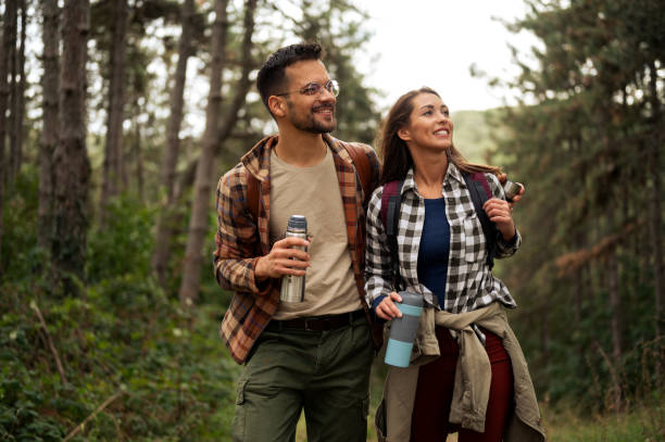 Beautiful young couple exploring nature