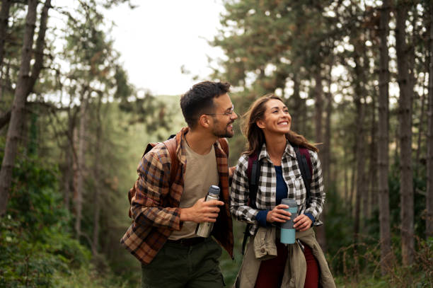 istock Beautiful young couple exploring nature 2198660718