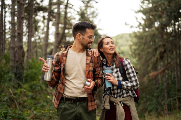 istock Beautiful young couple exploring nature 2198660732