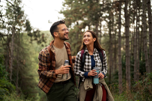 istock Beautiful young couple exploring nature 2198660740