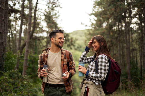 istock Beautiful young couple exploring nature 2198660742