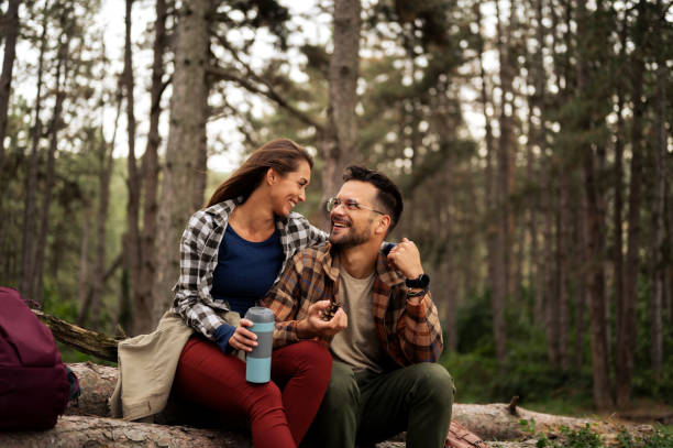 istock Beautiful young taking break from long walk in nature 2198662654
