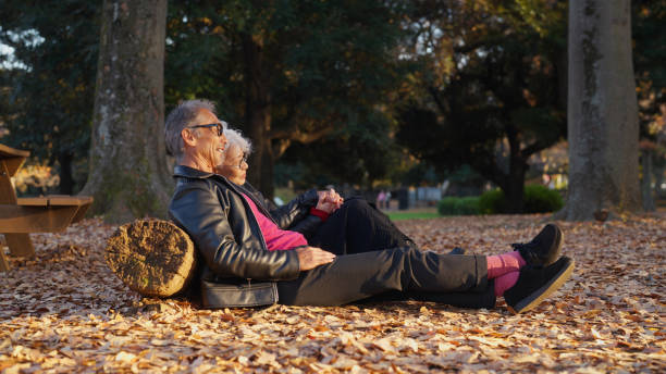 A heartwarming image of an affectionate couple embracing outdoors, celebrating love and companionship.
