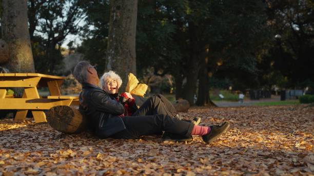 Happy couple relaxing together in the garden.