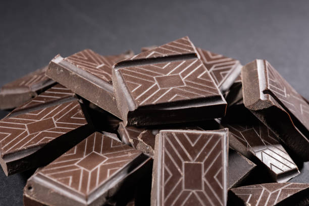istock broken chocolate bar chips, parts or pieces pile 2198670000