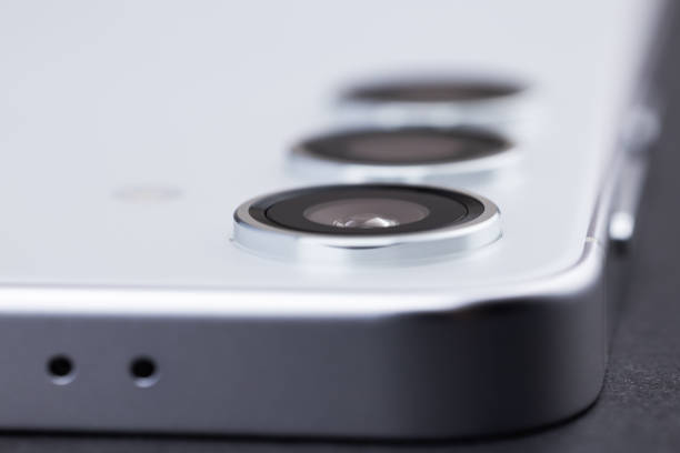 istock Modern smartphone camera lens, macro view. close up 2198670185