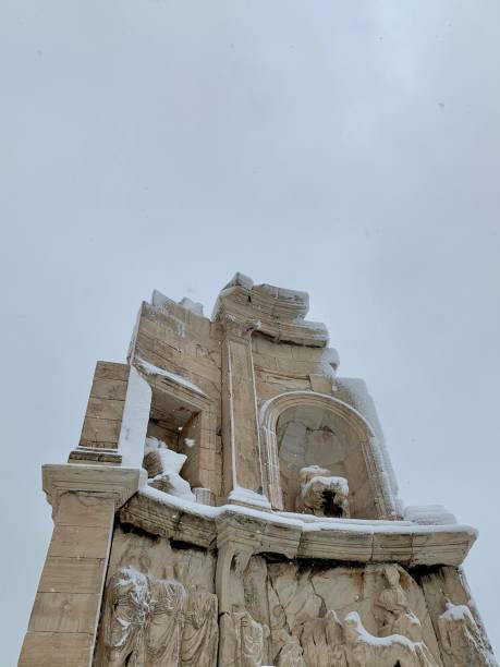 istock Philopappos monument in snow 2198674526