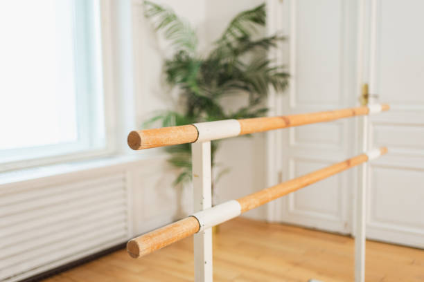 istock Empty ballet dance studio with barre. Professional ballet barre for stretching practicing dancing positions in dance school Dance hall ready for ballet class training. Ballet school. 2198674560