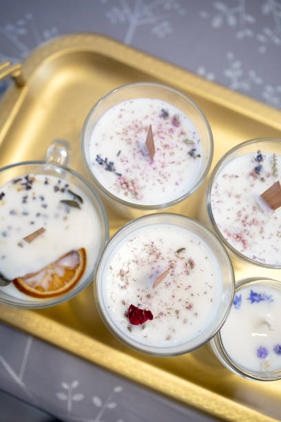istock candles on a gold tray. Handmade candles 2198676540
