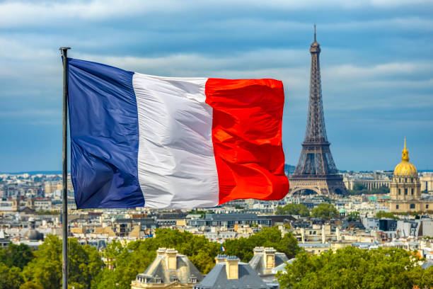 istock French flag with Skyline Paris and Tour Eiffel 2198676735