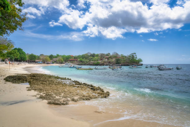 istock A Beautiful and Serene Tropical Beach Featuring Calm and Inviting Waters Along with Enjoyable Boating Activities 2198676869