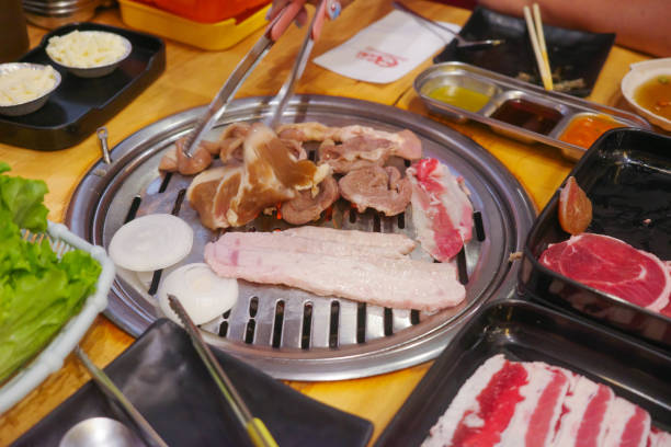 istock Korean restaurant with grilled pork and beef 2198679904