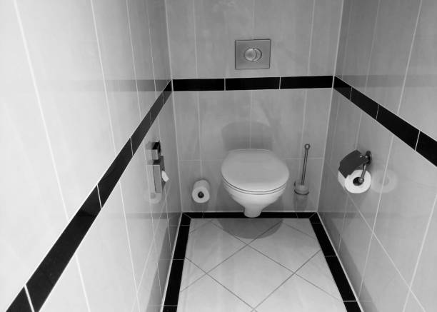 istock Modern Minimalist Bathroom Design with Wall-Mounted Toilet and Tile Decor 2198684727