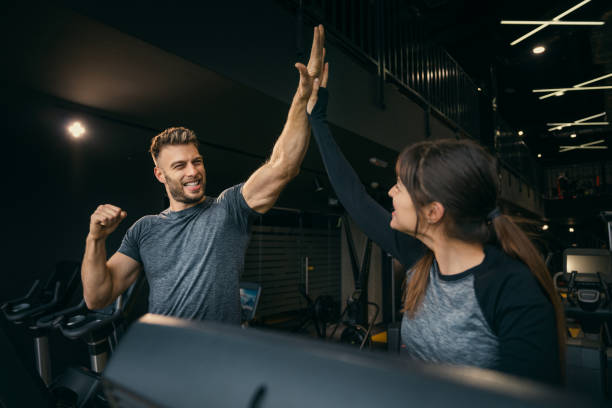 istock High-Five Hustle – Gym Couple Celebrating Their Run 2198685088
