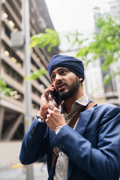 istock Confident Professional Talking on Smartphone in Urban Setting 2198685152