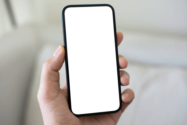 istock male hand hold phone with isolated screen background  light room 2198686101
