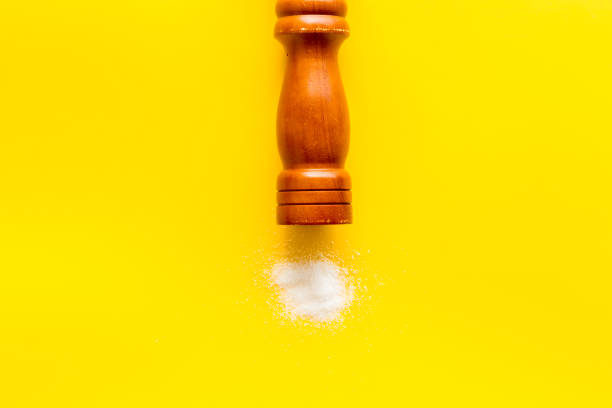 istock Fine salt in salt shaker and spilled salt. Cooking concept 2198686864