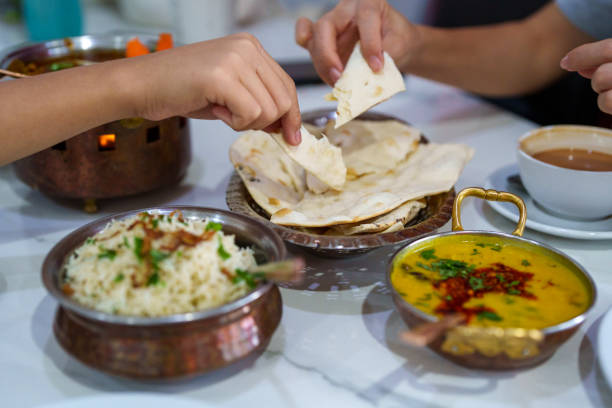 istock Indian Cuisine with Naan Bread and Dal Curry 2198687356