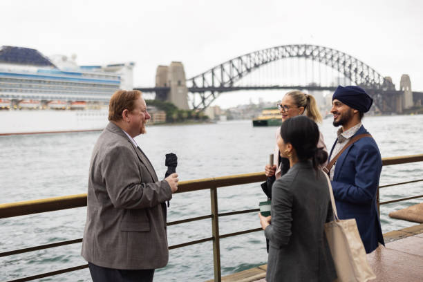 istock Multinational Business Professionals Socializing by Sydney Harbour Bridge 2198690235