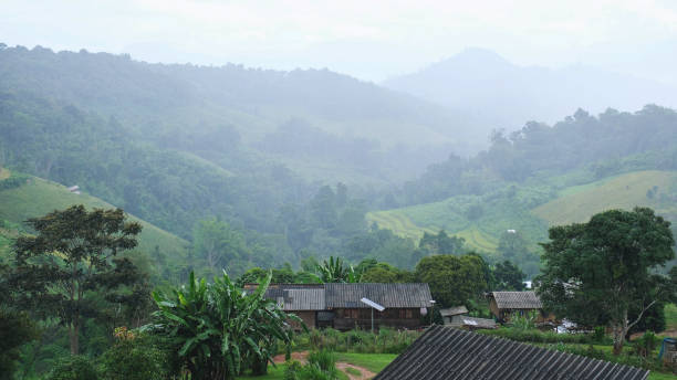 istock Rural village in the mountains on raining day 2198695155