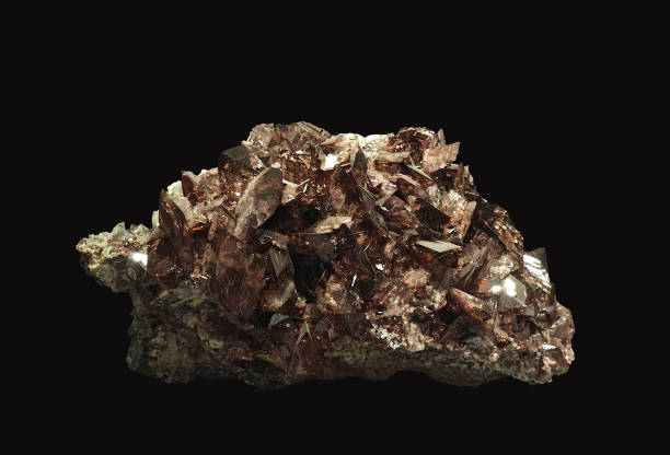 istock Close-Up View of Axinite Mineral Specimen on Dark Background 2198695532