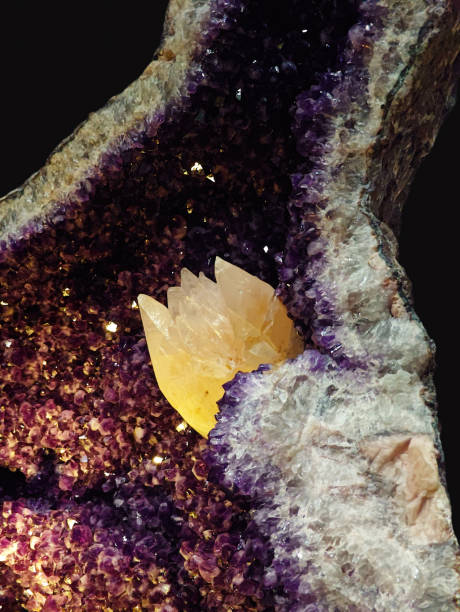 istock Close-Up View of Amethyst Quartz in Geode on Dark Background 2198695545