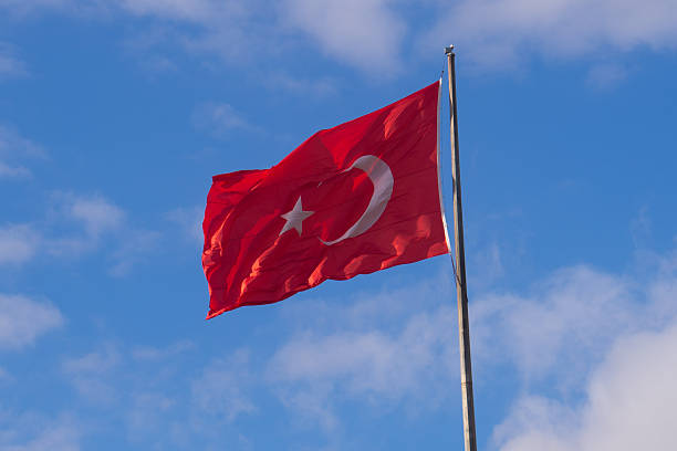 istock Turkish national flag hang on a pole in open air 2198696067