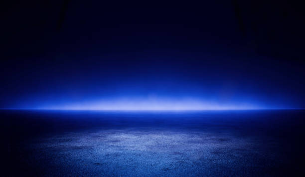 istock Neon Energy Circle Illuminated in a Stadium at Night With a Vibrant Blue Background 2198697713