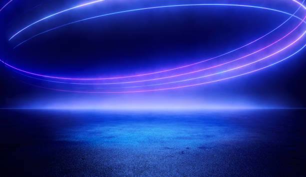 istock Blue, Violet and Pink Energy Circle Illuminated by Neon Lights in a Stadium Setting During an Evening Event 2198698126