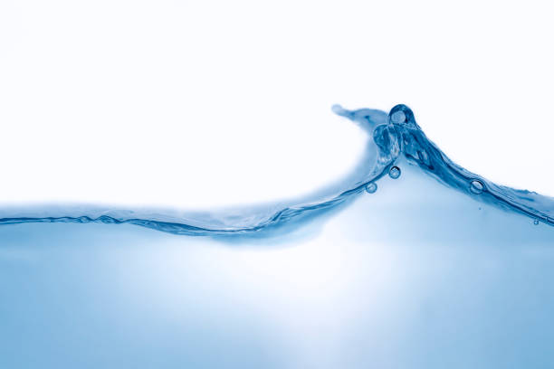 istock Closeup view of dynamic flowing blue water waves on white background. Liquid splash. Texture and abstract background 2198698346