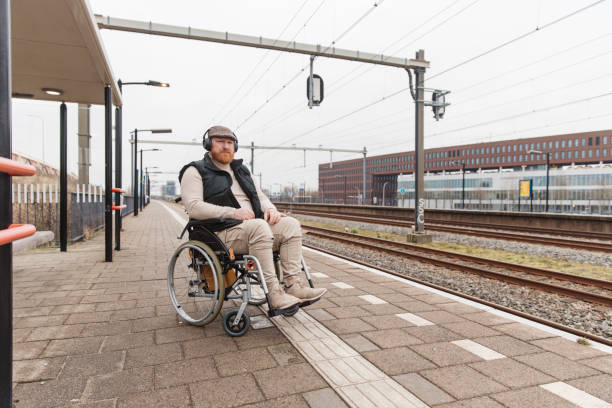istock A wheelchair bound commuter on a train day trip in the Netherlands 2198701516