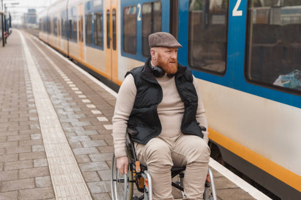 istock A wheelchair bound commuter on a train day trip in the Netherlands 2198701898