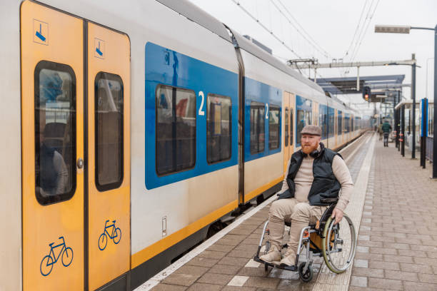 istock A wheelchair bound commuter on a train day trip in the Netherlands 2198701909
