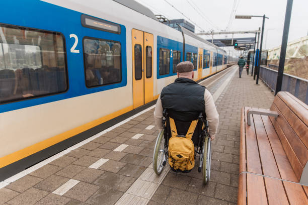 istock A wheelchair bound commuter on a train day trip in the Netherlands 2198701918