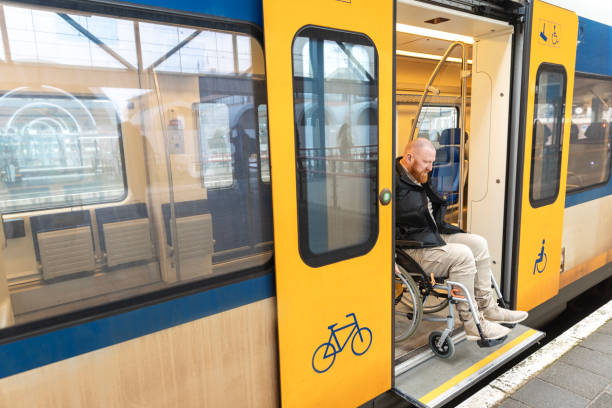 istock A wheelchair bound commuter exiting the train on a day trip in the Netherlands 2198702346