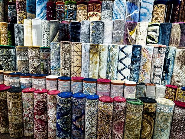 istock An exquisite decorative rug featuring an intricate floral and medallion design, displayed in a Jakarta carpet store. The rich patterns and vibrant colors showcase timeless elegance and fine craftsmanship 2198704165