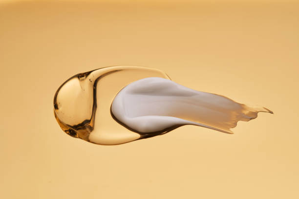 istock Textures of different cosmetic products on a gold background. 2198704660