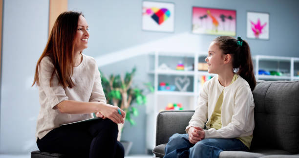 istock Psychiatric social worker provides child treatment 2198704816