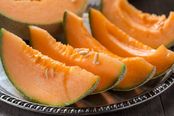 istock ripe melon cut into pieces on a platter 2198706258