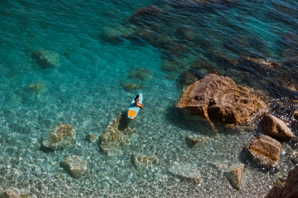 Enjoying the paddle board at sea