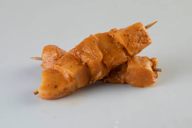 istock BBQ fish meat on skewers isolated nature background with clipping path 2198711191