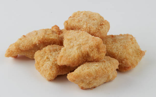 istock Chicken nuggets isolated nature background with clipping path 2198711225