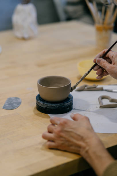 istock Close-up of a ceramic cup in progress, showing precise craftsmanship 2198711487