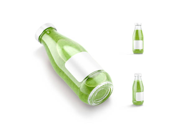 Blank transparent glass kiwi juice bottle mockup, different views, 3d rendering. Empty sweet kiwis smoothie canned jar mock up, isolated. Clear vegan squeezed beverage bottles template.
