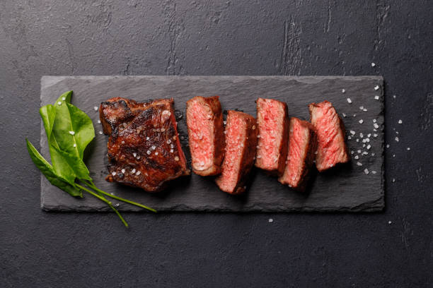 istock A perfectly cooked sliced striploin steak with a juicy, tender texture 2198712937