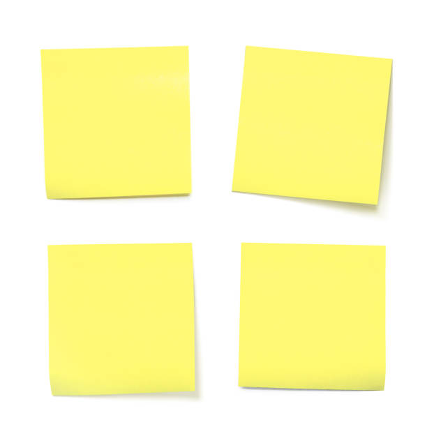 istock Four Yellow Sticky Notes in Different Positions Are Arranged Neatly on a White Background, Offering a Versatile Tool for Reminders or Creative Brainstorming Sessions. 2198715477