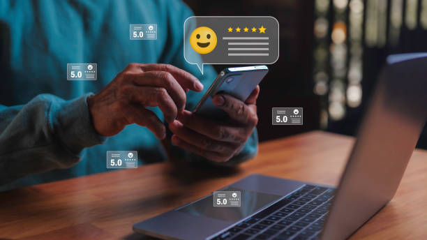 istock Businessman have rated their service experience five-star on online applications. Customer satisfaction surveys allow customers to evaluate service quality and obtain reputation rankings 2198719713