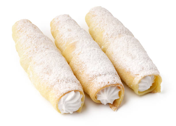 istock Sweet cream-filled desserts topped with powdered sugar served on a plain background 2198721263