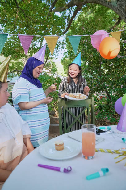istock Disabled friends celebrating birthday 2198722392