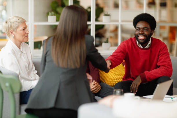 istock Business Handshake in a Collaborative Meeting 2198722434